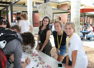 How school clubs are going to be held with both in-person and virtual students This picture was taken at 2018 Club Rush.