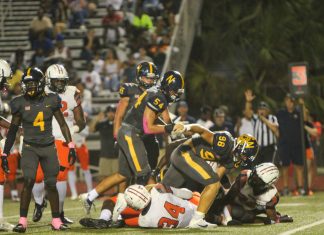 PHOTOS: Naples takes the win for the 49th annual Coconut Bowl against Lely with a score of 59-0
